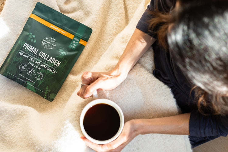 Woman putting primal collagen in her coffee